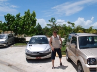 Summer 2008 (Cuba). Our old and new cars - a Peugeot-y and a Suzuki Jiminy