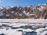 Baikal, Olkhon island, Хужир. March 2018. View of Olkhon from Baikal ice