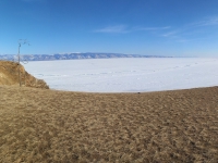 Baikal, Olkhon island, Хужир. March 2018. View of the frozen Baikal and the beach