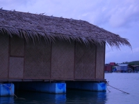 Thailand 2005. A house, floating on the sea on big floats